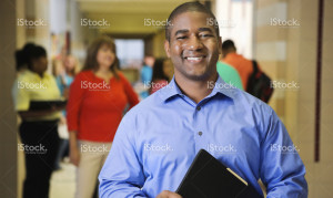 teacher in school hallway